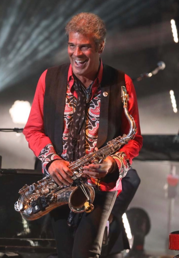 Mark Rivera on stage with saxophone